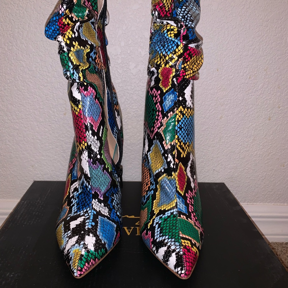 **Attention getter snake print boots**
